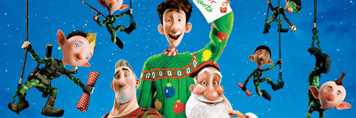 Against a darker blue background, several elf characters hold into ropes hanging from above. The character Arthur, with messy brown hair a bright green Christmas jumper, smiles at the camera, holding up a letter.