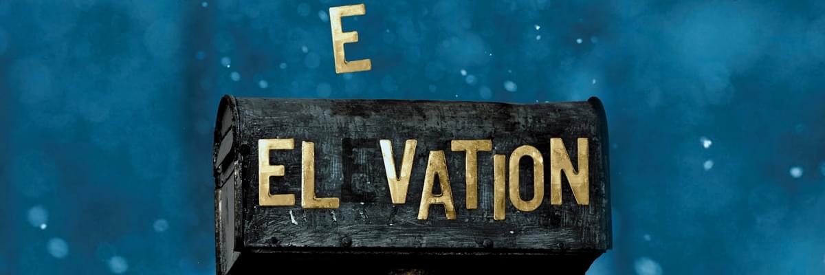 A dark grey mailbox has the letters Elevation stamped on it in large, gold lettering. The second 'E' of the word floats above the mailbox. The background is a dappled dark teal blue.
